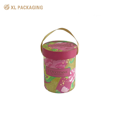comprar Embalagem de cilindro de papel rosa de tubo de papel cosmético de creme facial com alça de fita online manufacture
