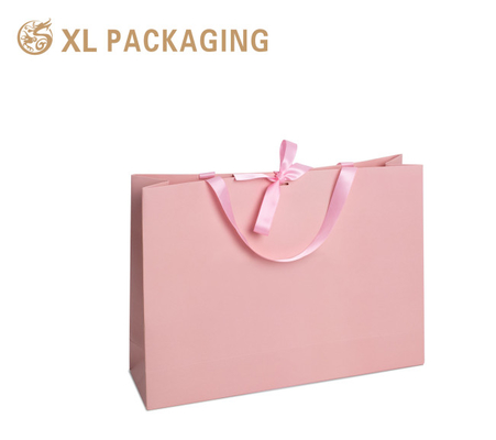comprar Bolsa de presente de papel de luxo Rosa Boutique Bolsas de embalagem de papelão 250G Gsm Com o seu próprio logotipo online manufacture