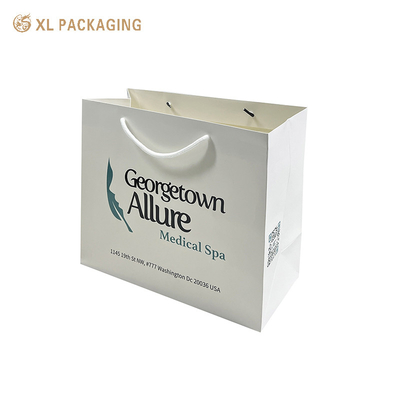 Logotipo da empresa personalizado Bolsas de papel de compras Bolsas de papel revestidas de alta qualidade Bolsas de mão para roupas Calçados e embalagens de varejo - Mãos resistentes Gloss / Matt Lamination & Bulk Order Descontos