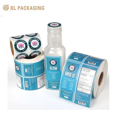 Etiquetas adesivas personalizadas XL Packaging com impressão em relevo branco, adesivo de um lado, acabamento fosco/brilho, impressão de alta resolução, ideal para branding, embalagem de produtos e aplicações decorativas.