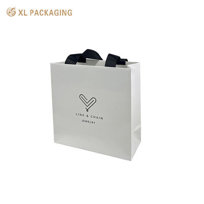 Bolsas de papel de hotel descartáveis personalizadas com alças de fita de algodão